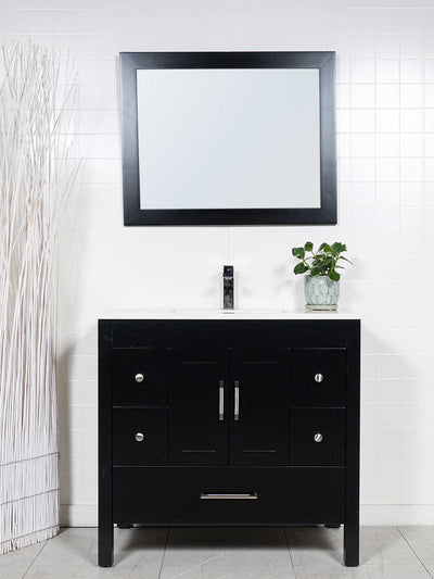 black vanity with matching mirror, white counter