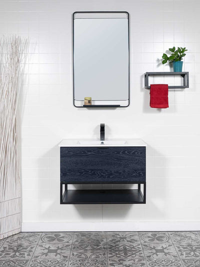 Blue vanity floating style with black aluminum framed mirror. small shelf. white sink