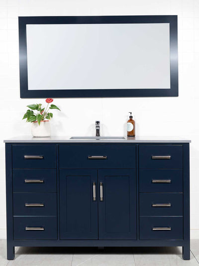 Large blue bathroom vanity with matching mirror