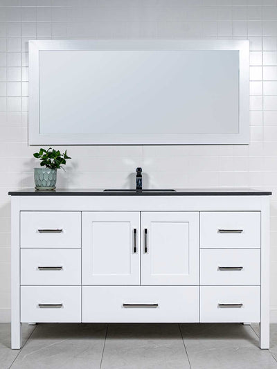 white bathroom vanity with grey quartz counter, wite framed mirror