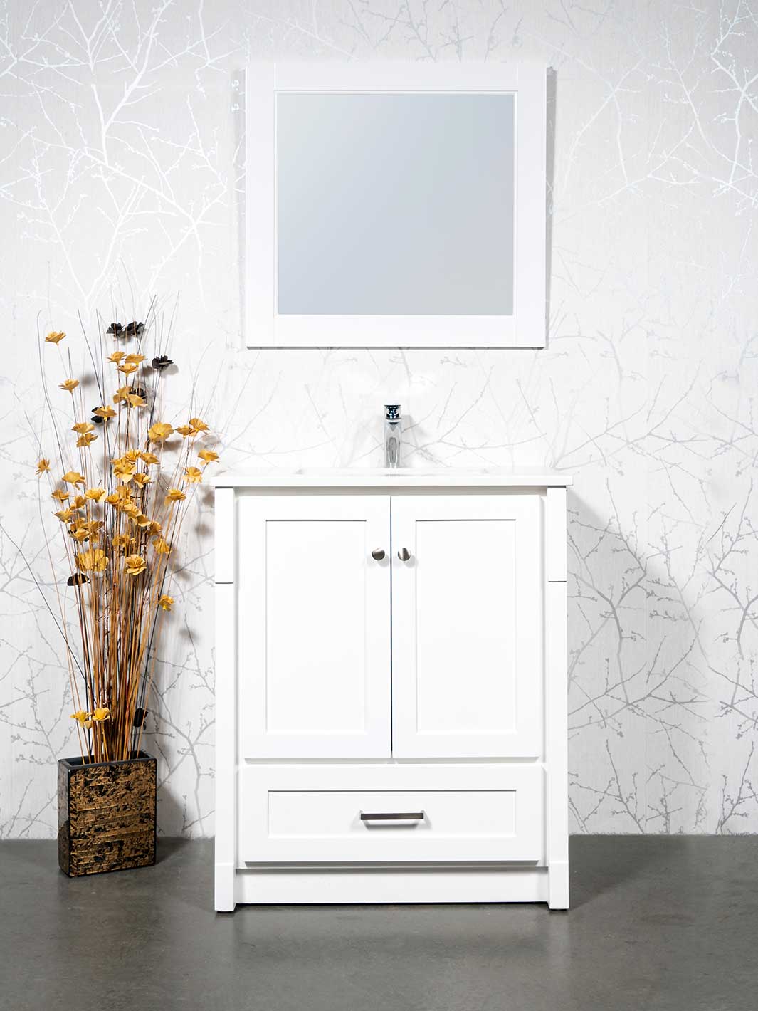 white vanity with kickboard, white framed mirror, white quartz counter, and chrome faucet
