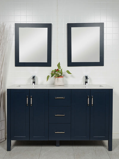 blue double vanity with matching mirrors, quartz counter, chrome faucet and pulls