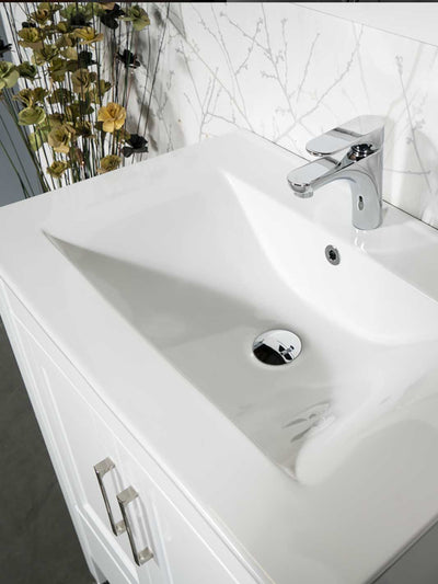 one piece ceramic sink with chrome faucet