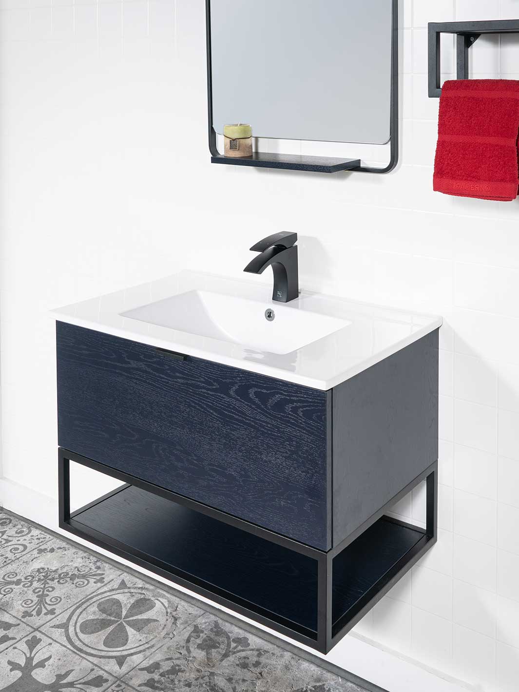 Blue black floating style vanity with white ceramic sink, and black faucet