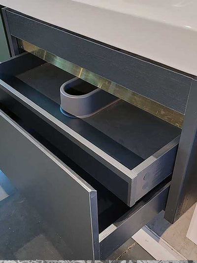 Small drawer beneath sink