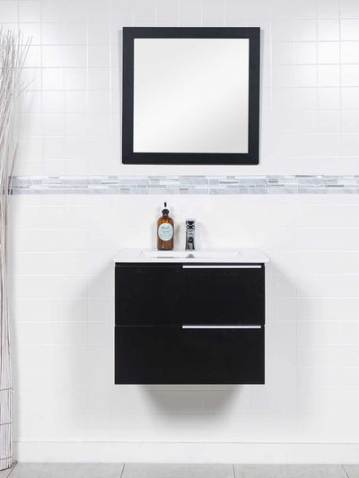two drawer floating black vanity. white ceramic sink, chrome faucet and black wood framed mirror