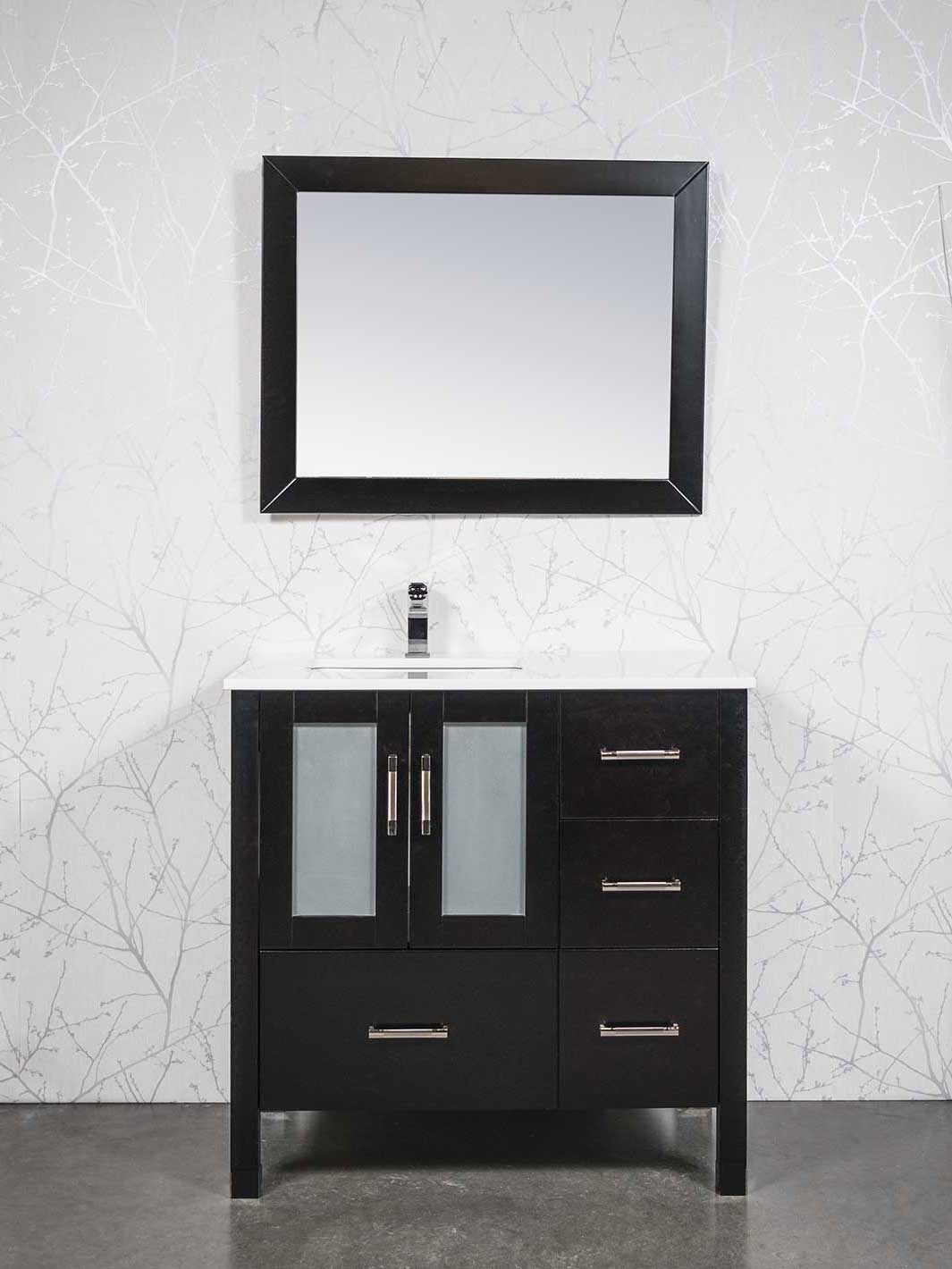 36 inch black vanity with sink on the left side. white counter and black wood framed mirror