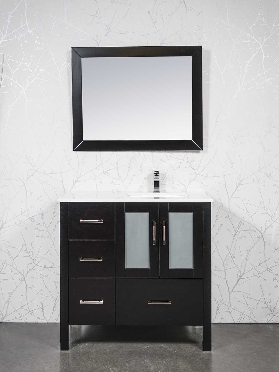 black vanity with sink on the right side. white counter. black wood framed mirror
