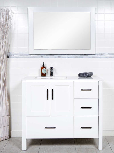 41 inch white vanity with sink on the left and drawers on the right. Bottom drawer. White wood framed mirror
