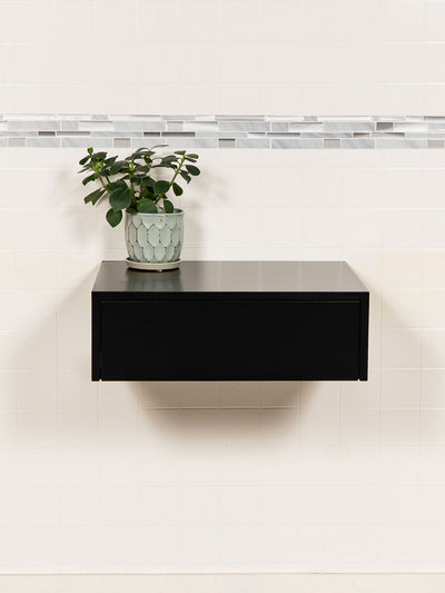 black flowing makeup table