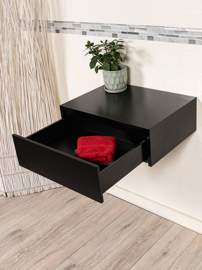 make up table with single drawer pulled open
