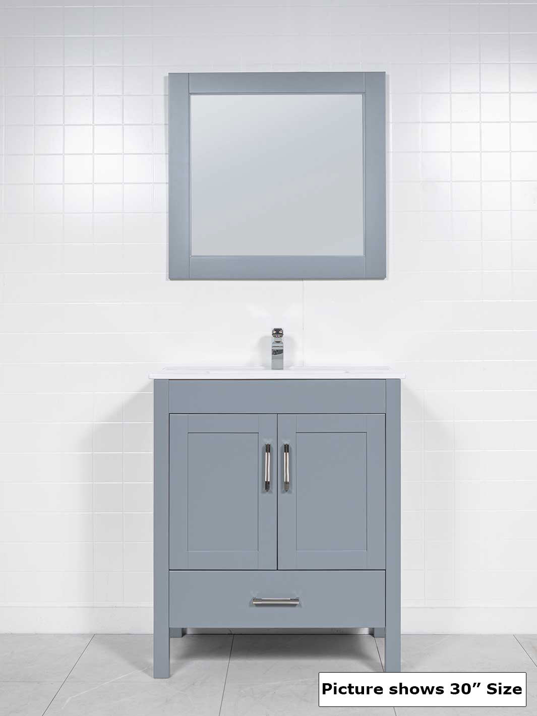grey cabinet with white sink and grey mirror. chrome faucet