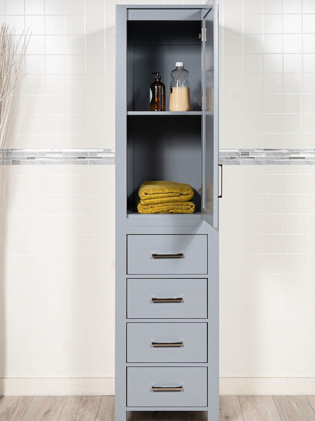 grey linen cabinet with doors open. 2 shelves