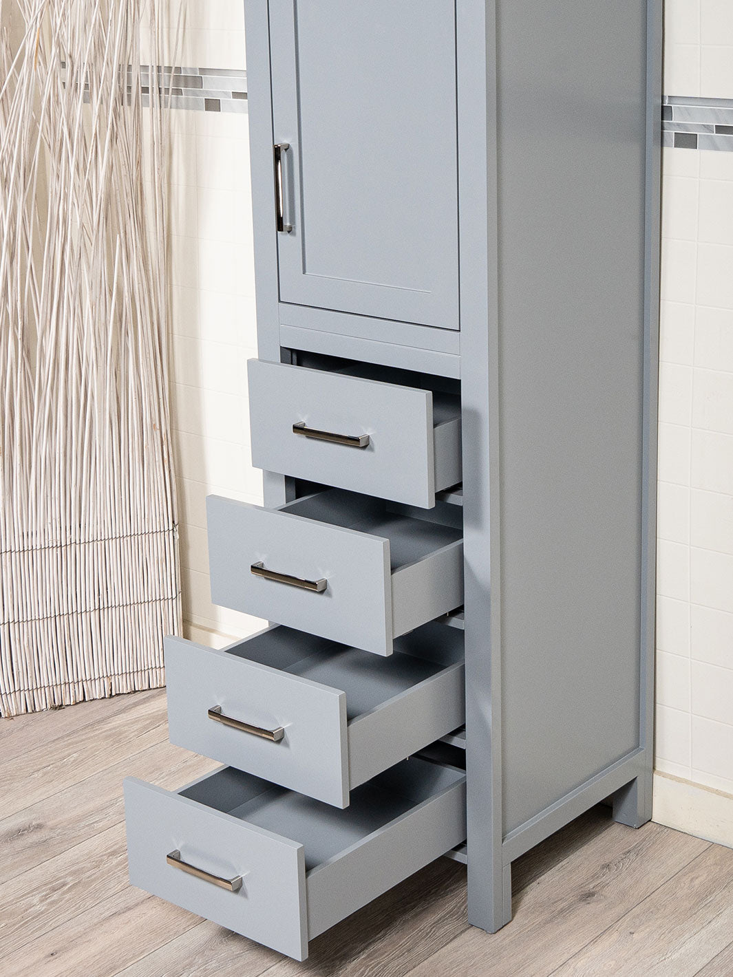 drawers open on grey linen cabinet