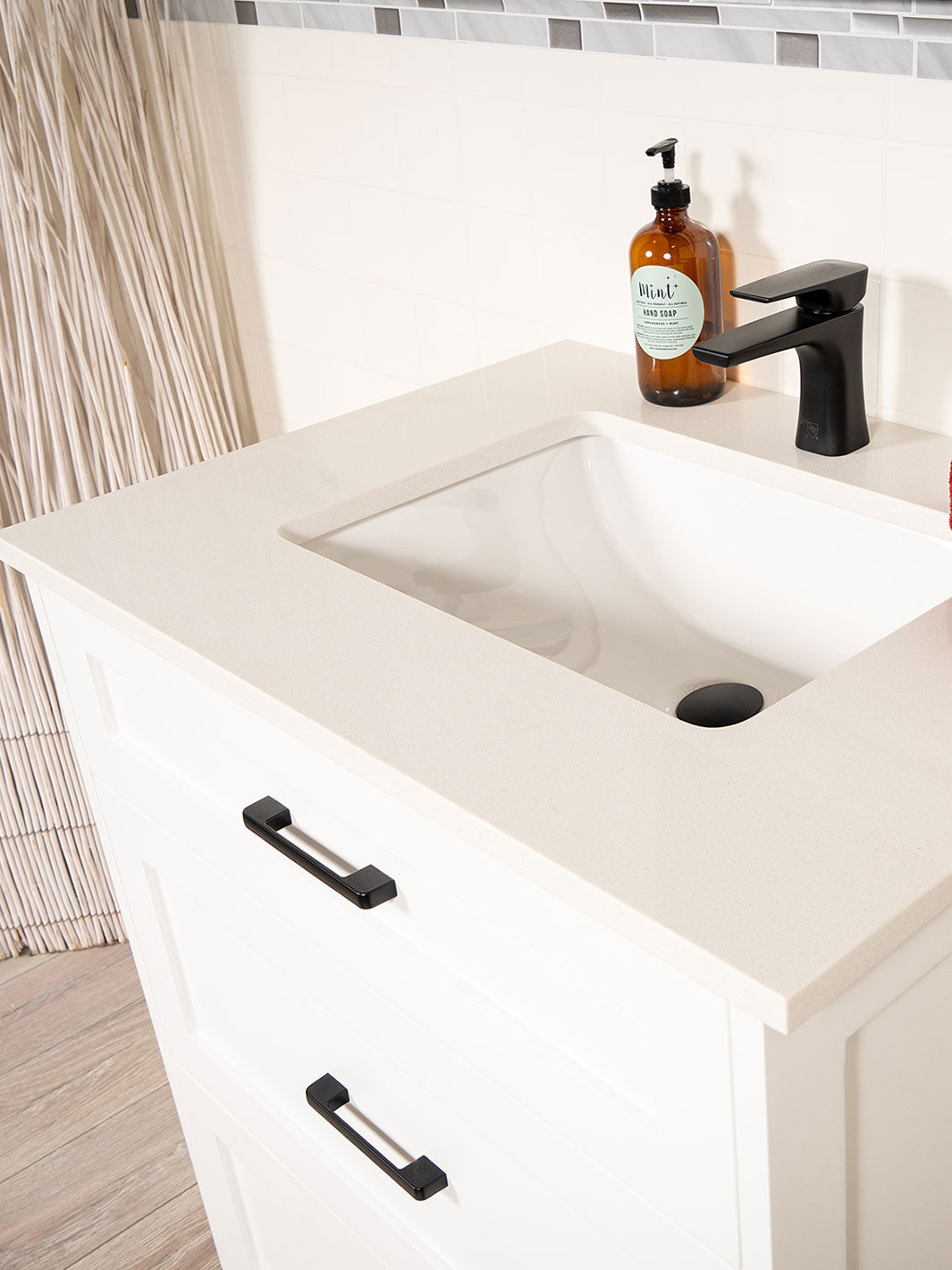 counter, black faucet