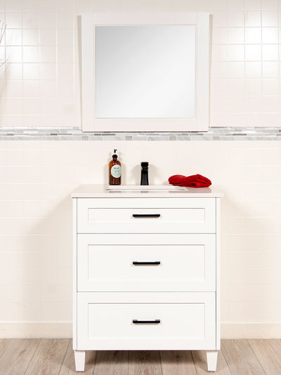 white 30 inch vanity with black pulls, white wood framed mirror