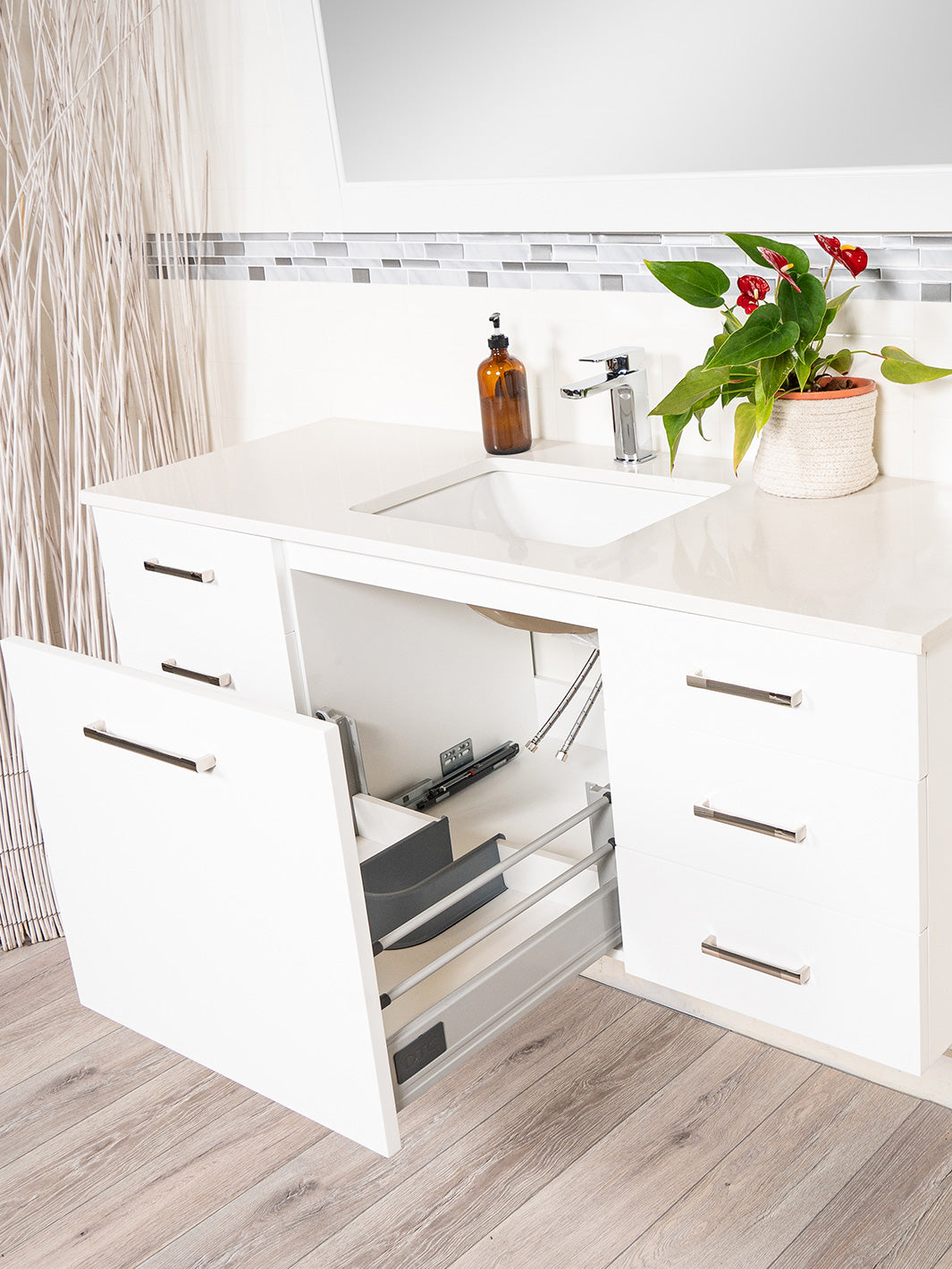 floating vanity deep drawer in the center. chrome faucet