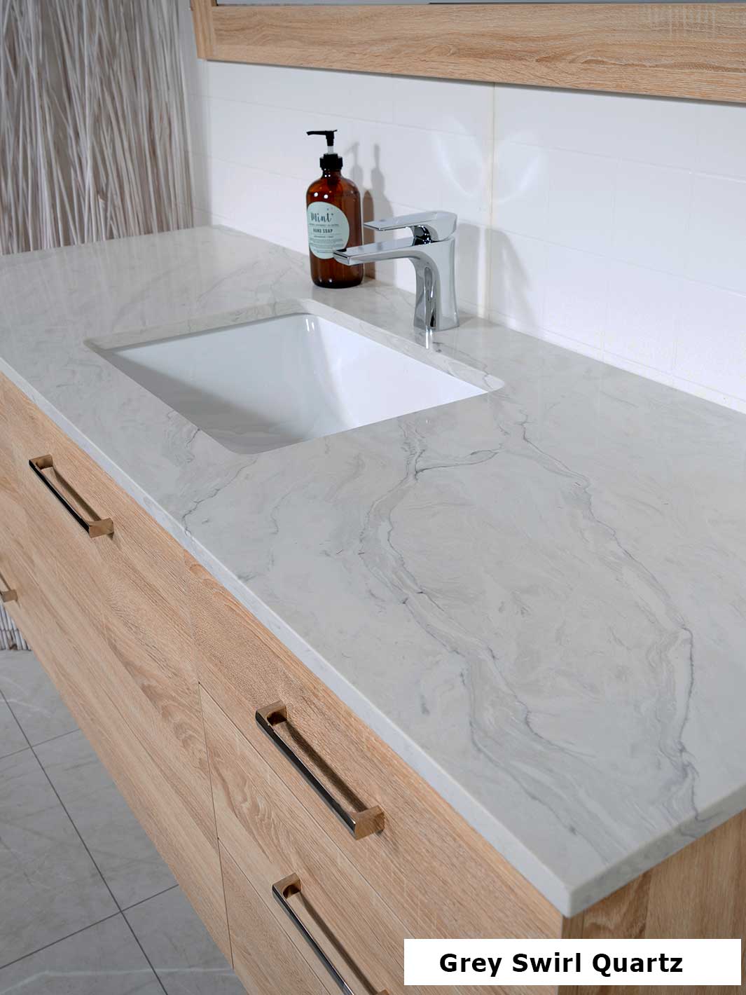 quartz counter with a sink attached