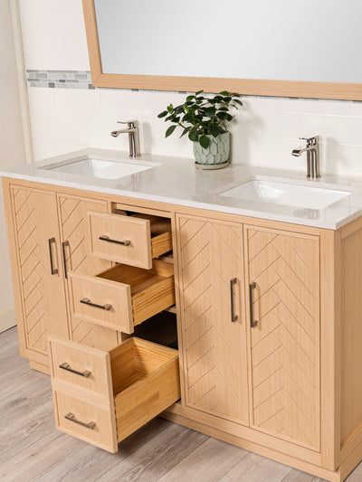 three drawers on the double vanity. the bottom drawer is double deep