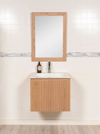 24 inch reeded vanity with counter, faucet and wood framed mirror