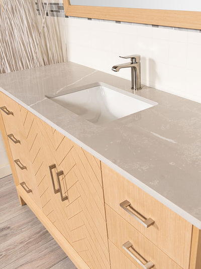 quartz counter is grey with white veining