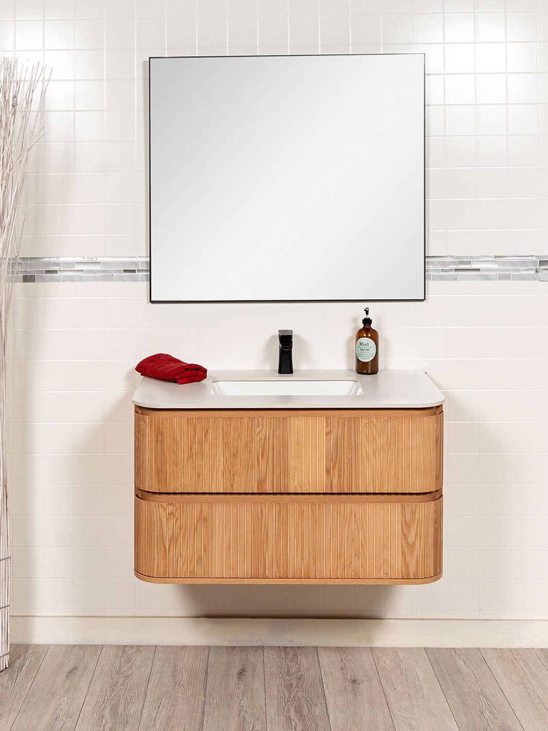 reeded vanity floating style 36 inches wide. black aluminum framed mirror and black faucet