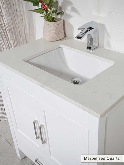 quartz counter with ceramic sink and chrome faucet