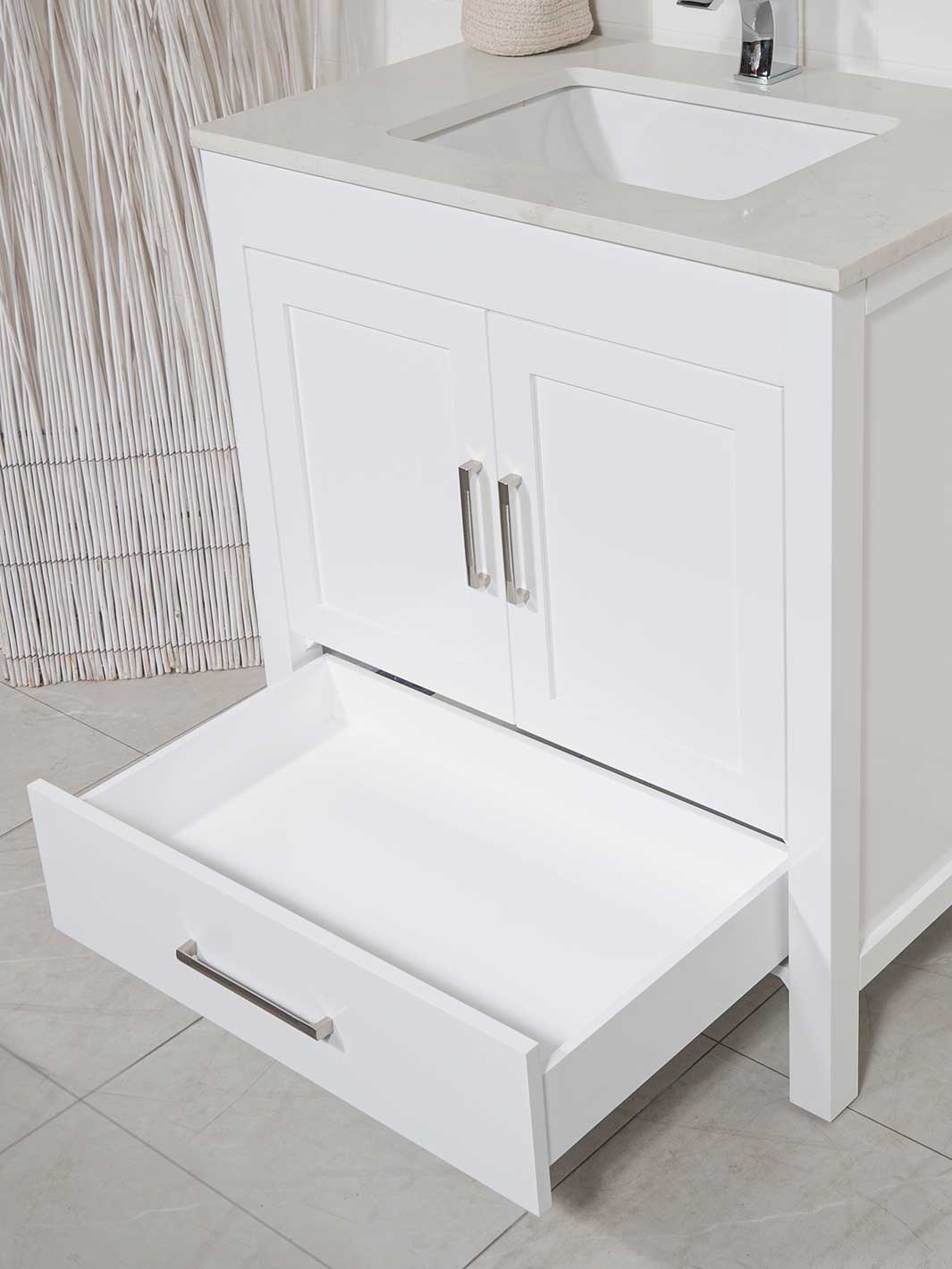 32 inch white bathroom vanity with bottom drawer, quartz counter, and chrome faucet