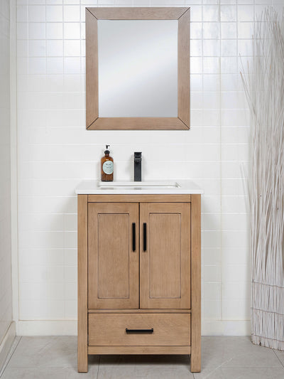 white oak vanity with matte black handles and faucet, wood framed mirror, and quartz counter