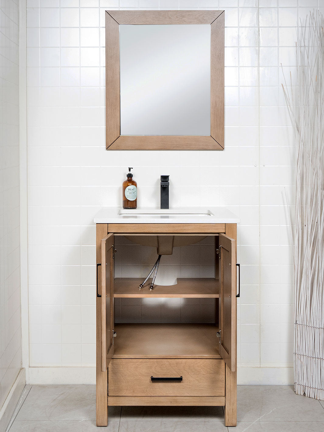 Open cupboard and a shelf below the sink