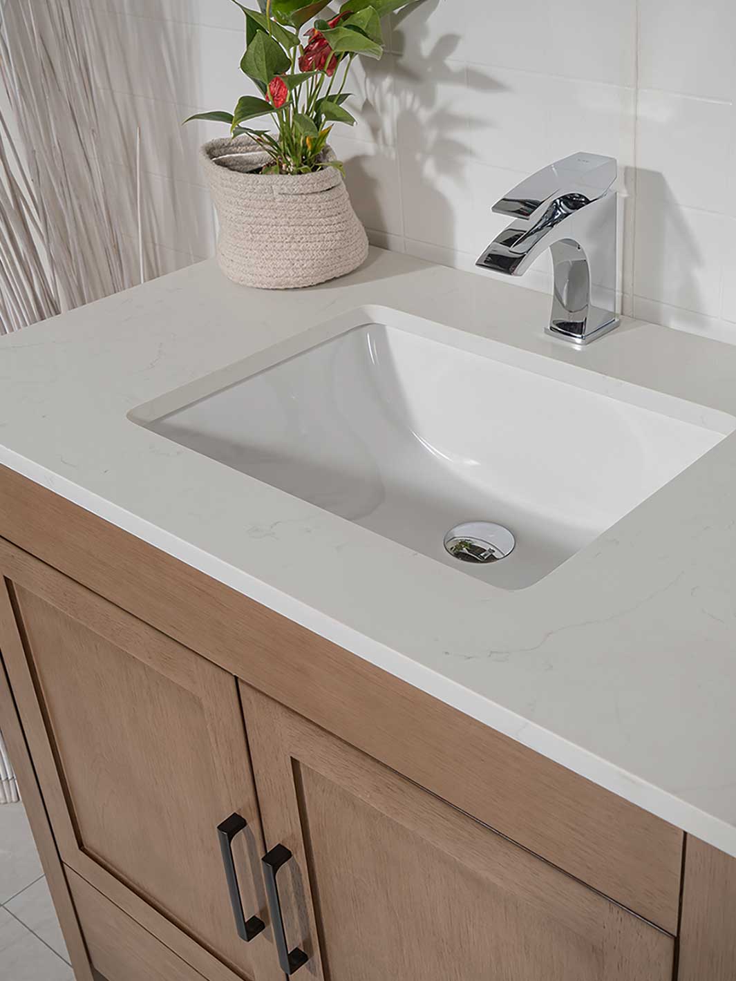 quartz countertop with undermount sink. 