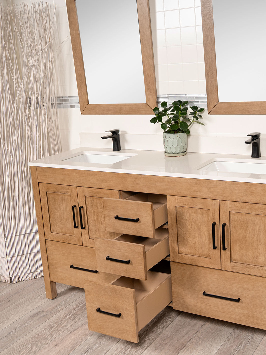 three open drawers in the center of the vanity