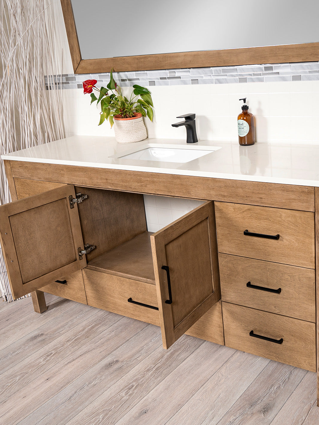 white oak vanity with cupboard doors open