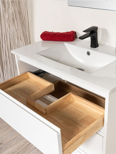 top drawer cut out for drain. white single piece ceramic sink