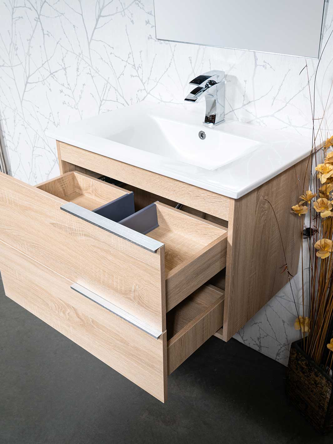 floating vanity wood grain finish two soft closing drawers. white ceramic sink and chrome faucet 
