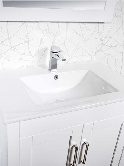 white ceramic sink with chrome faucet
