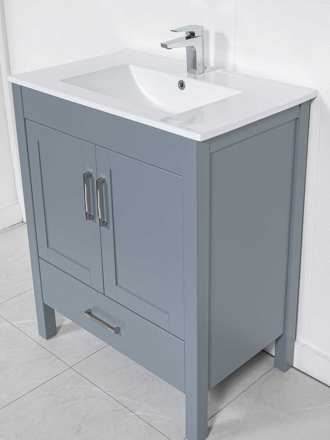 side view grey vanity with white ceramic sink, and chrome faucet