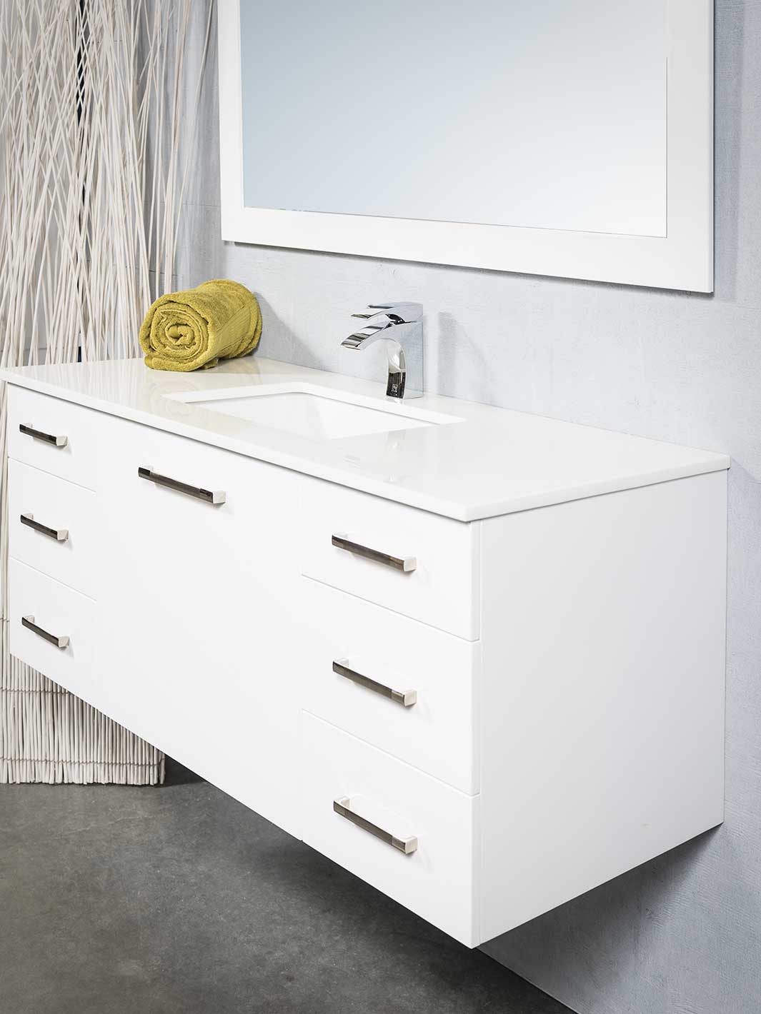 white floating vanity with white counter, faucet and mirror
