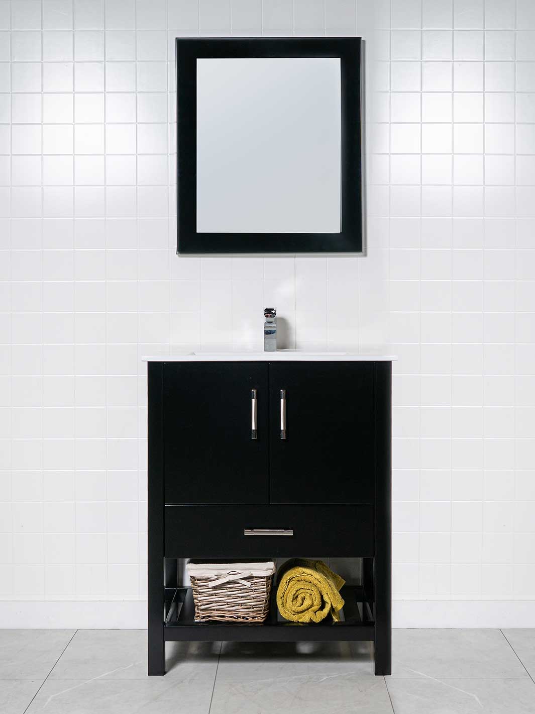 30 inch bathroom vanity set with a black cabinet, white sink and black framed mirror