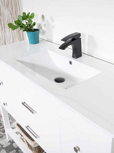 White sink with black faucet