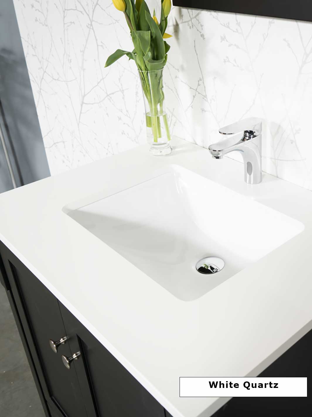 white quartz counter with chrome faucet